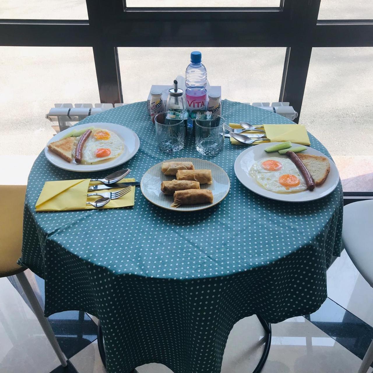 Mika Hotel Алматы Экстерьер фото